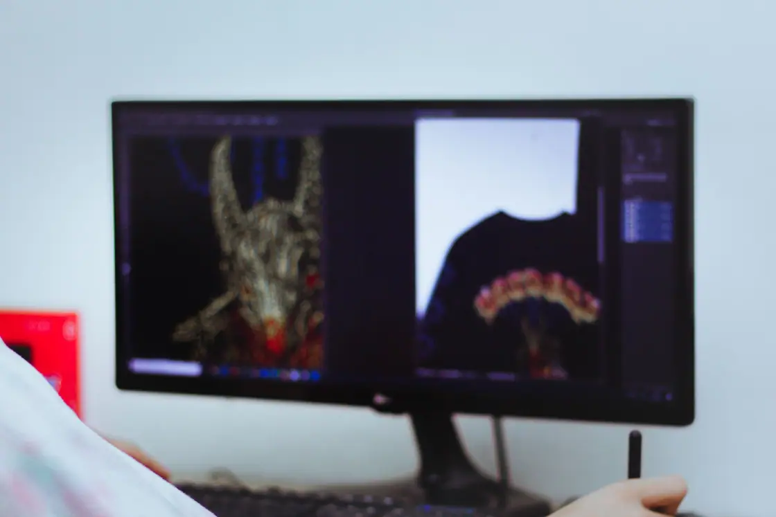 Designing artwork on screen photograph