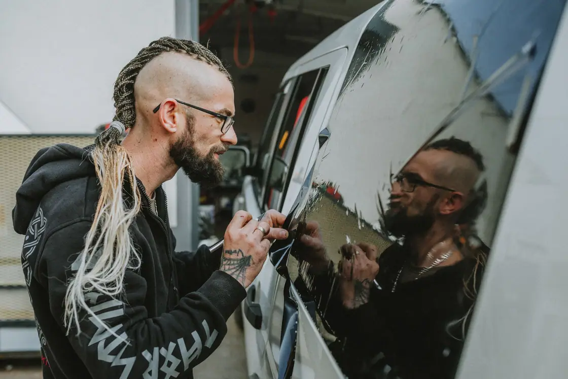 Fitting a graphic to a vehicle door photograph