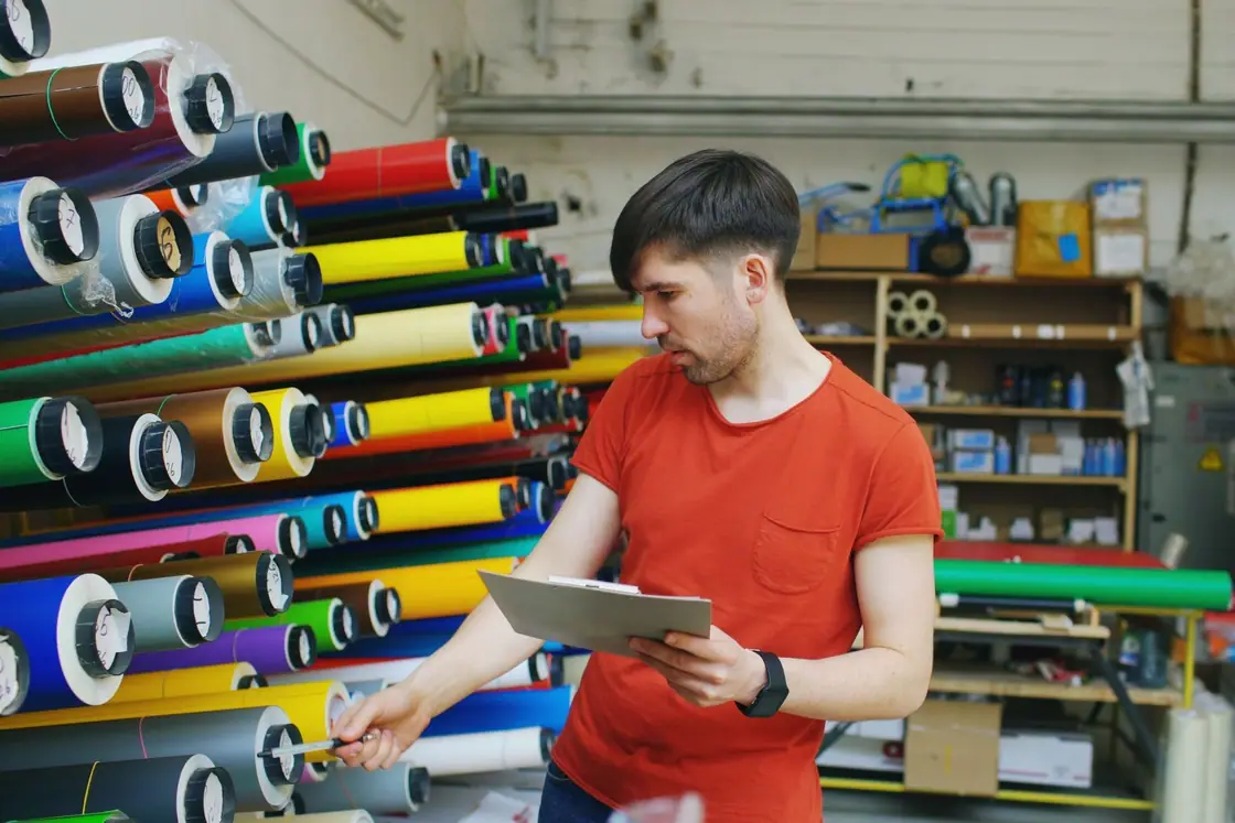 Vinyl rolls in a sign shop photograph